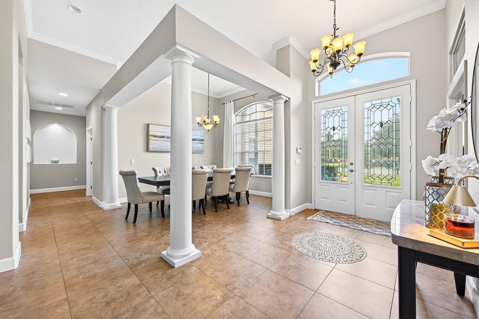Double entry doors, formal spaces and a dedicated office set the tone for this versatile floor plan.