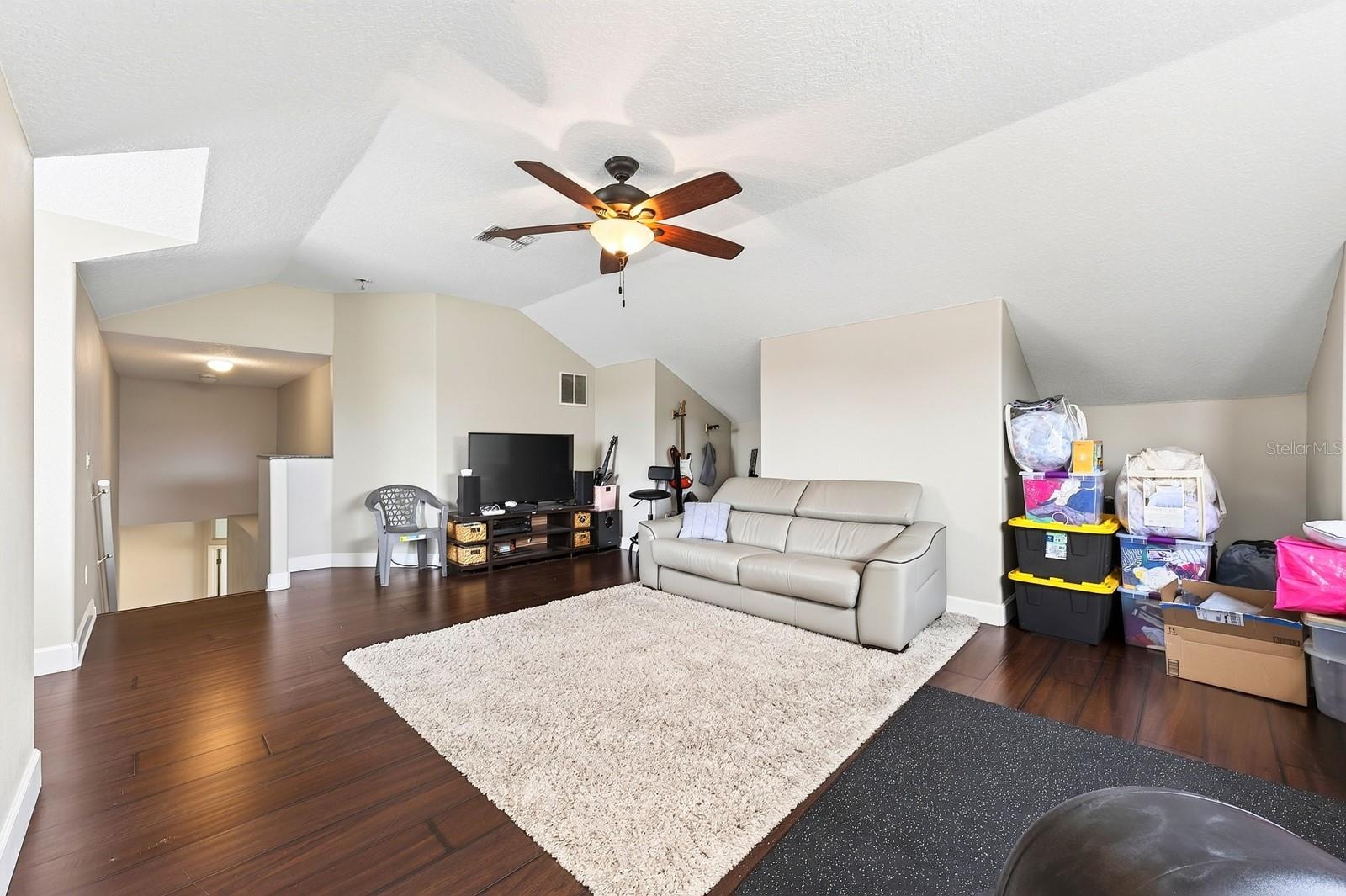 The entire second floor is a flexible bonus space.