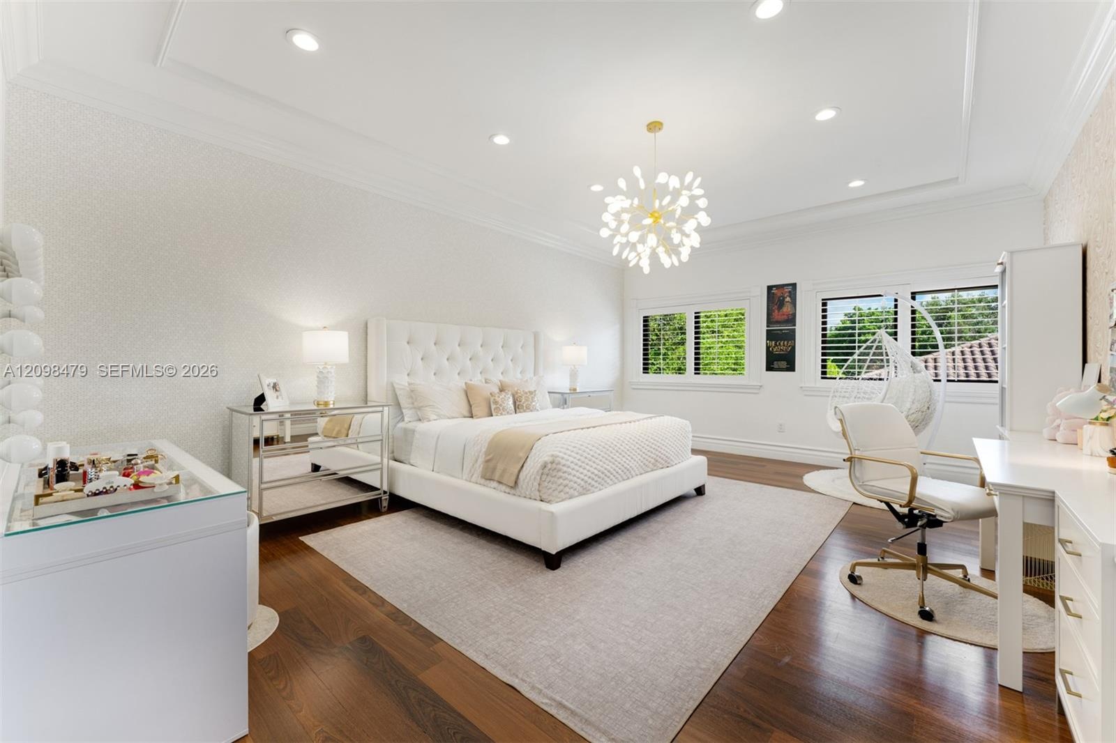 Tray ceiling with recessed lighting and crown molding