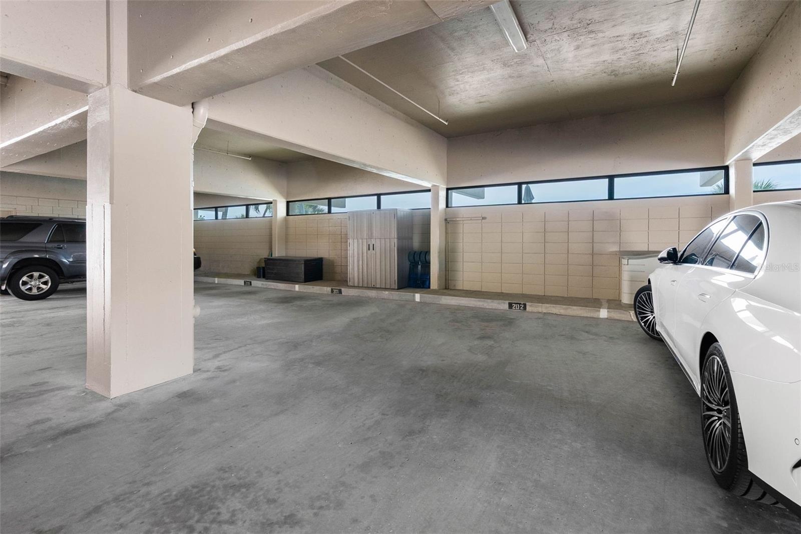Secure Gated underbuilding garage assigned parking