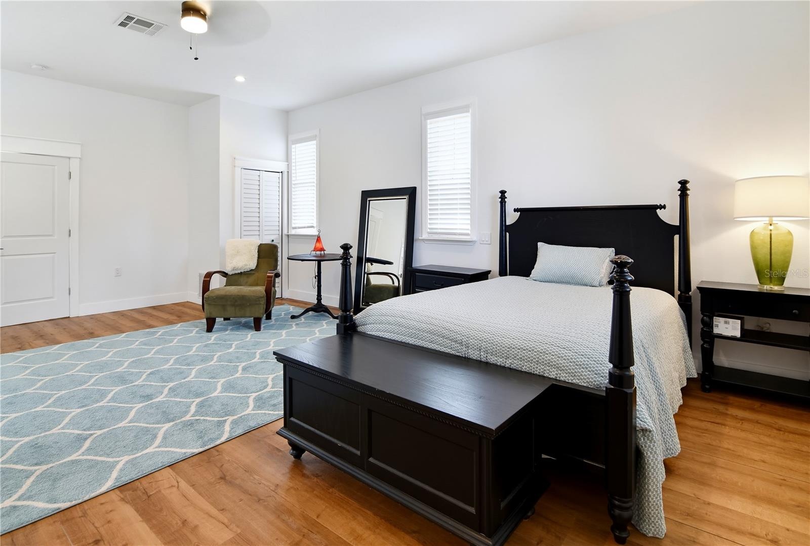 Expansive upstairs primary bedroom with plenty of space for a seating or work area.