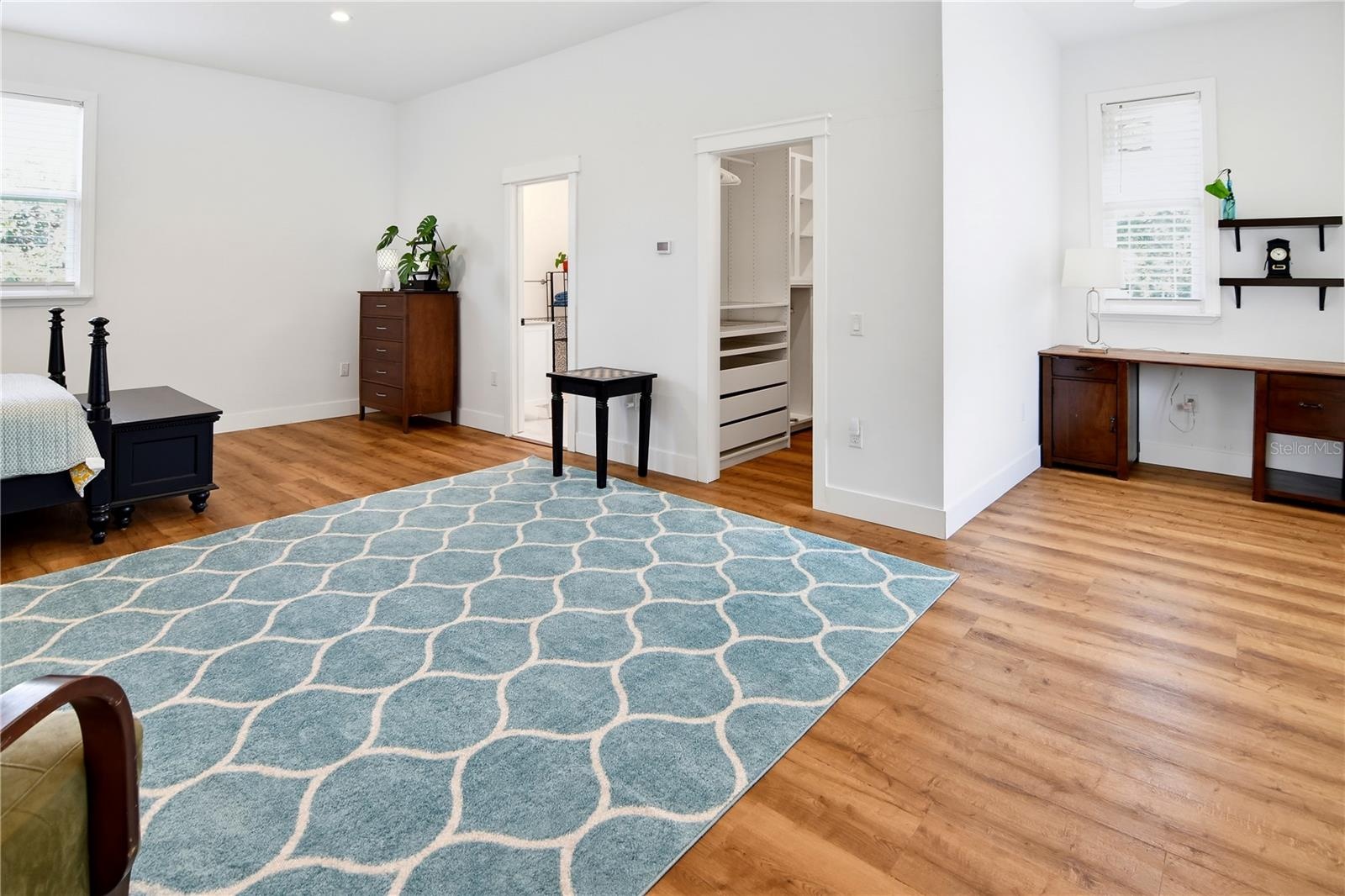 Spacious primary suite with a dedicated built-in office alcove.