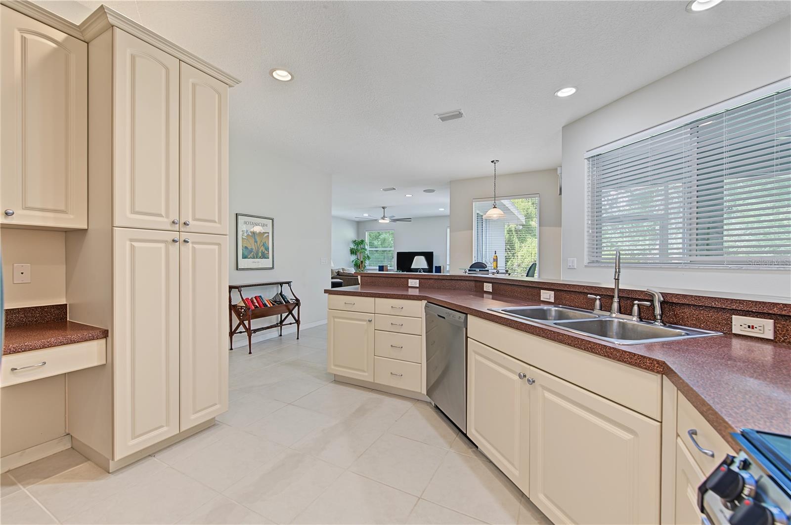 Open Kitchen to the Living Room and Family Room, stainless steel appliances.