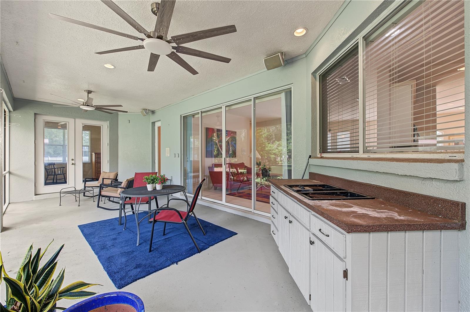 Back Porch with new ceiling fans - French doors off of the master Bedroom