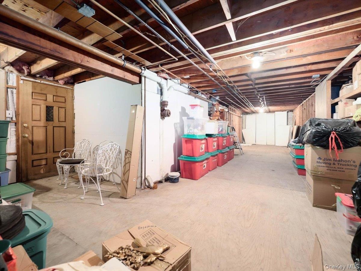 Basement with Bilco door. Loads of storage