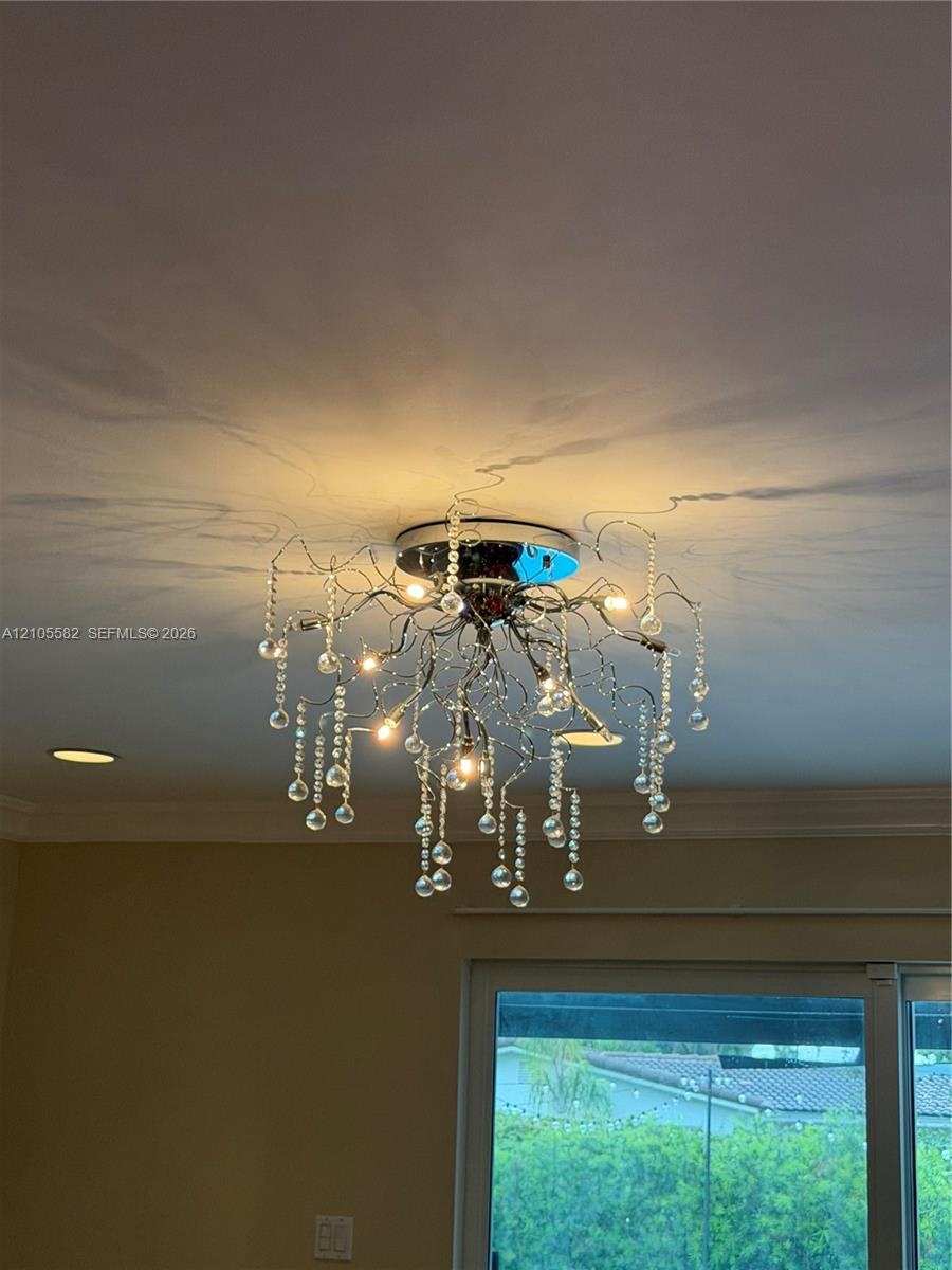 Decorative ceiling-mounted light fixture with crystal details