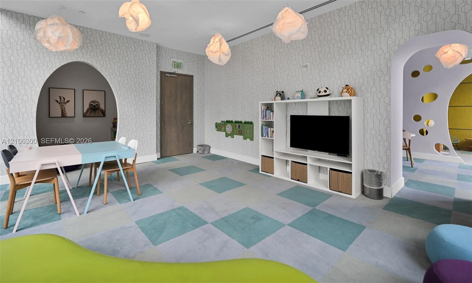 Geometric wallpaper, checkerboard pattern flooring, integrated white shelving unit, and custom arched entryways