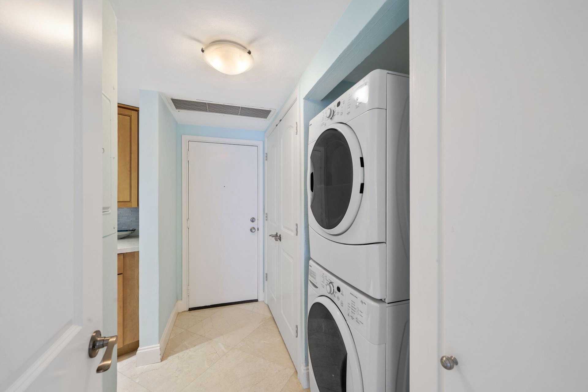 Laundry Room located inside the Condo.