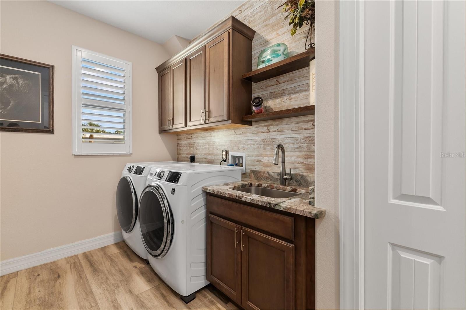 Laundry Room With Sink and Closet