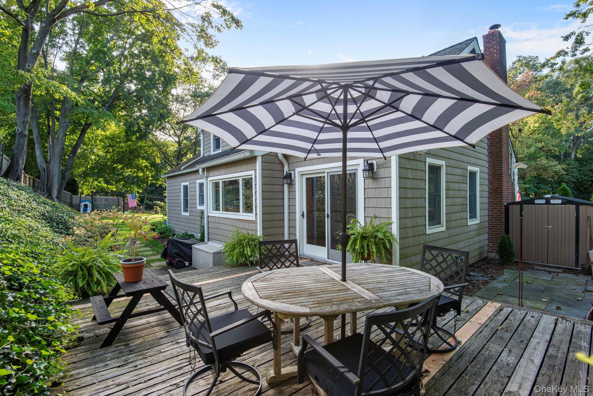 Private deck and garden area behind the house.