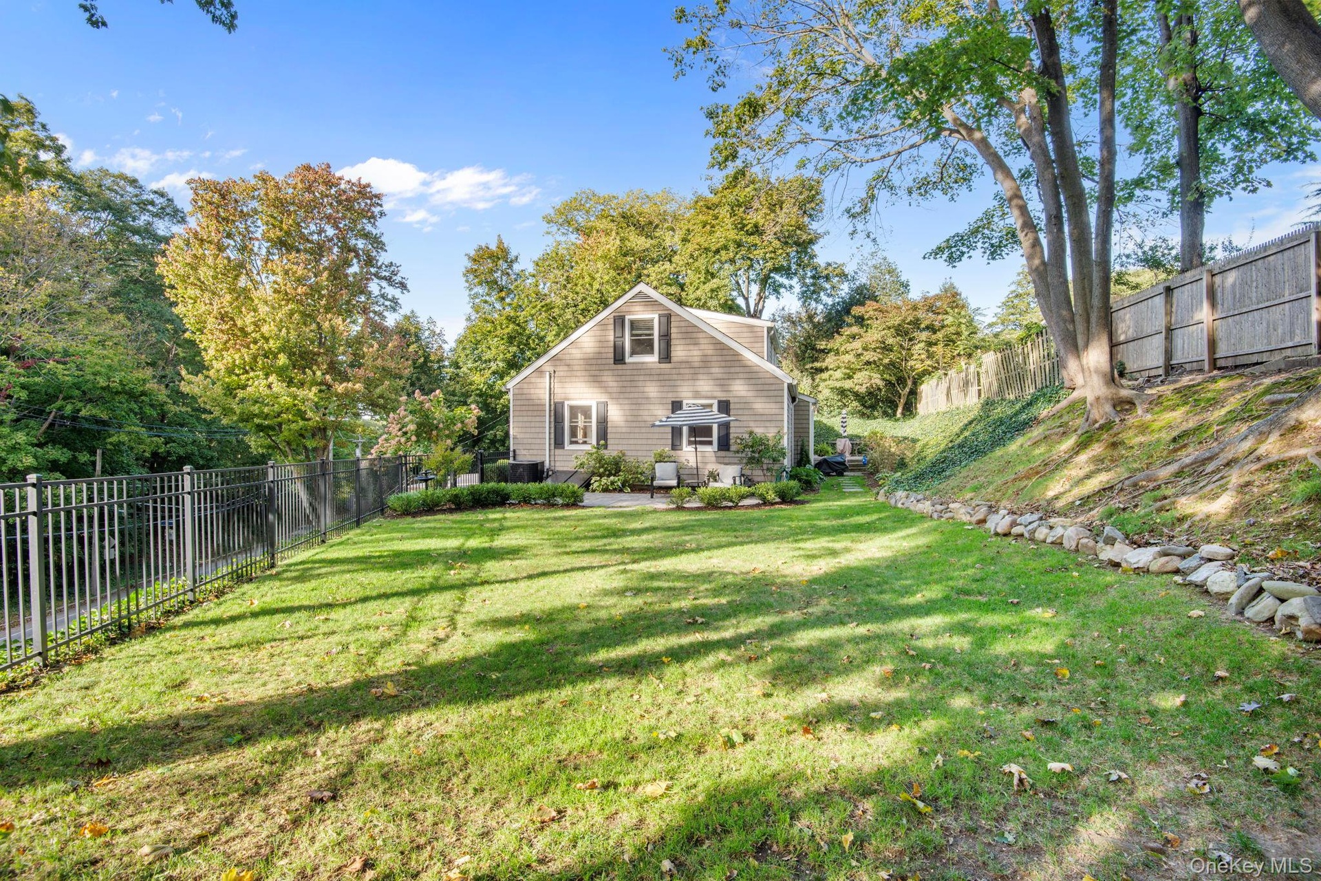 Large flat yard fully fenced.
