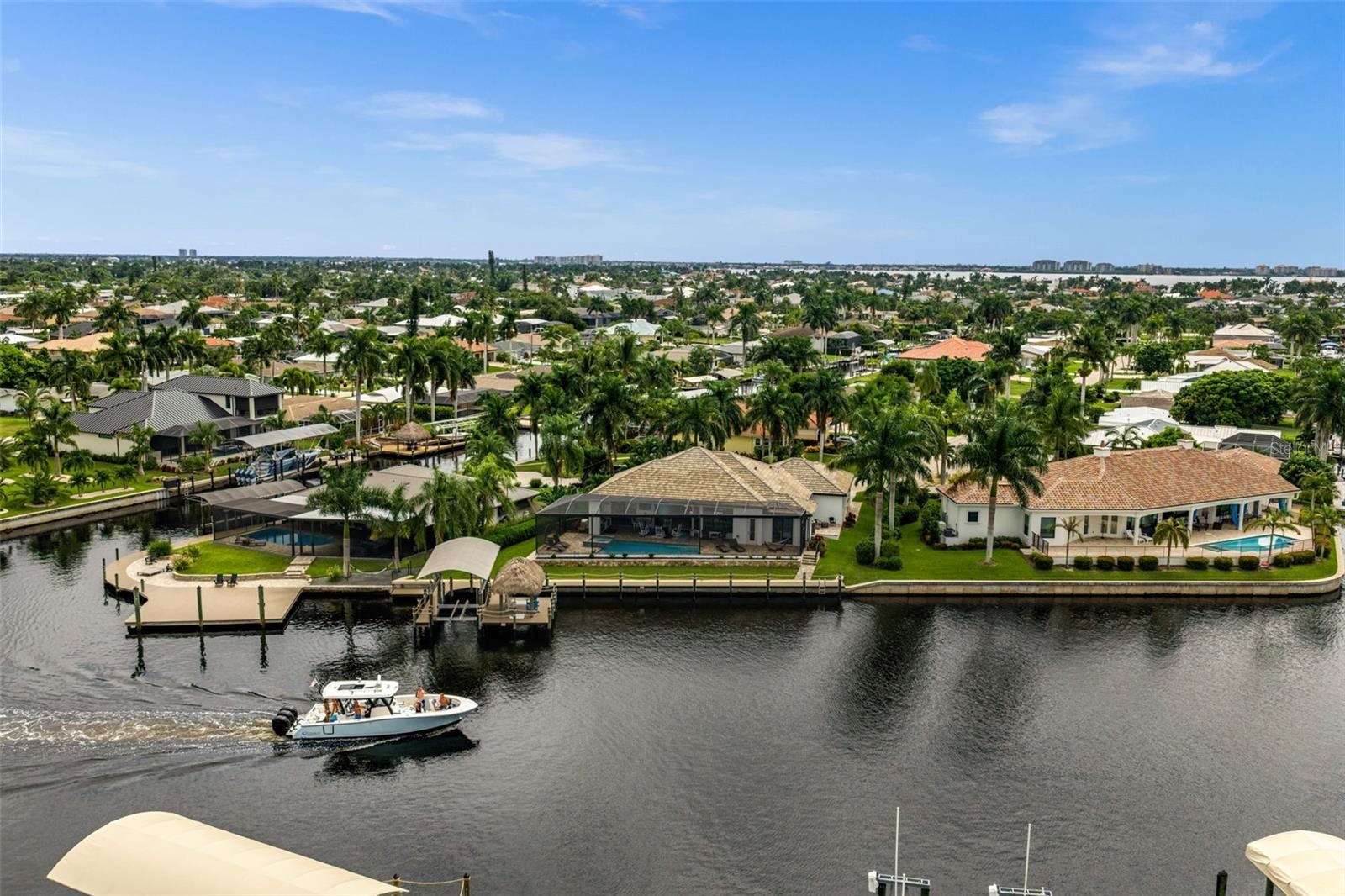 Watch the boats go by on the famous, extra-wide Bimini Canal