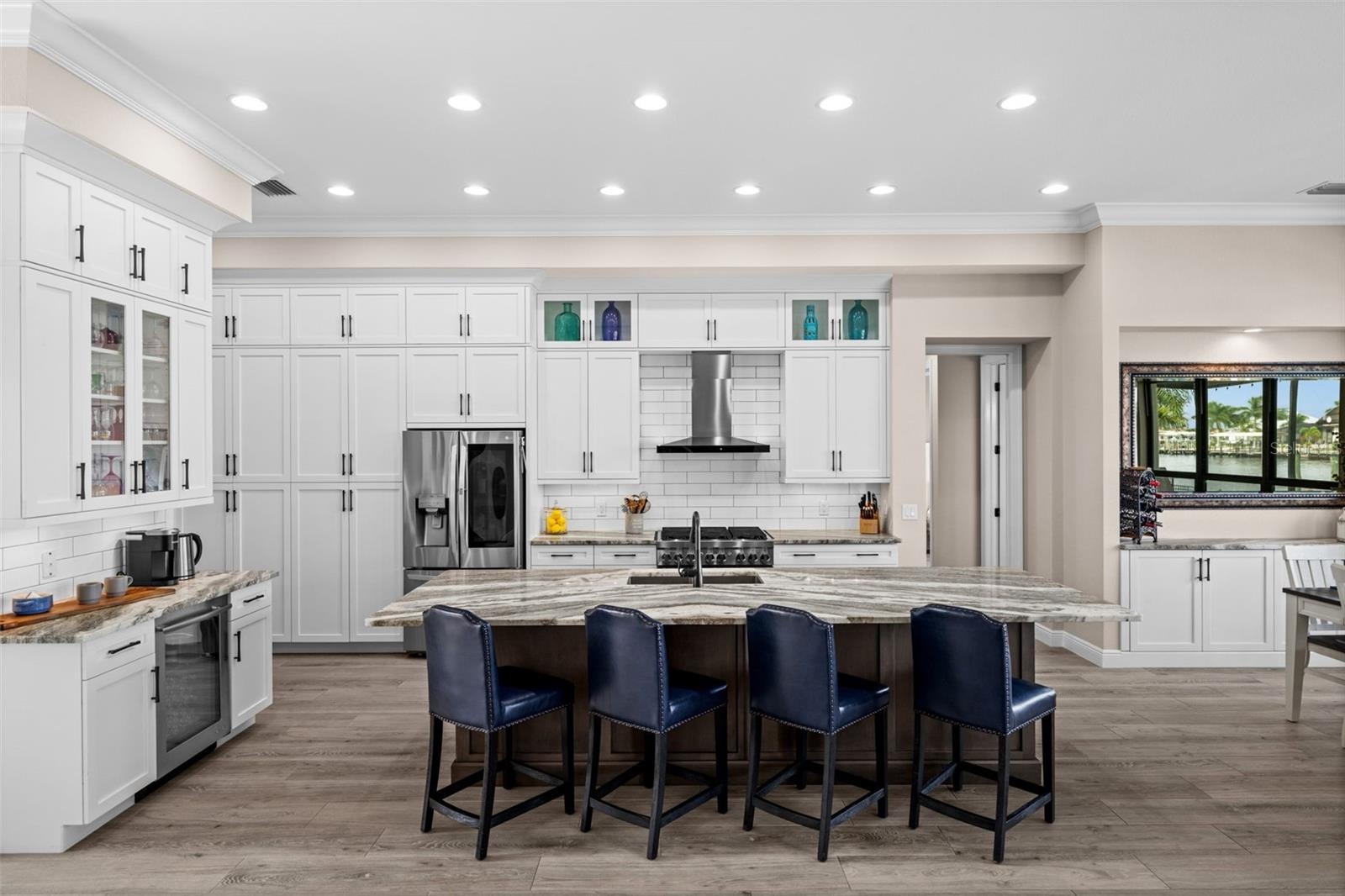 Coffee bar with beverage cooler next to the island