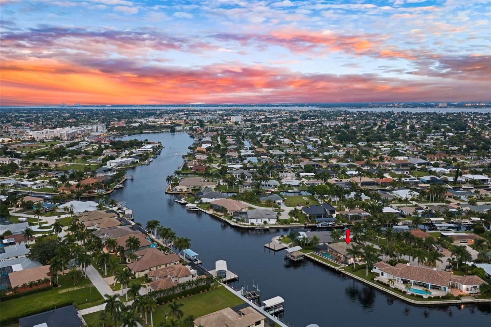 Aerial evening view with Bimini Square and Downtown Cape Coral in the background
