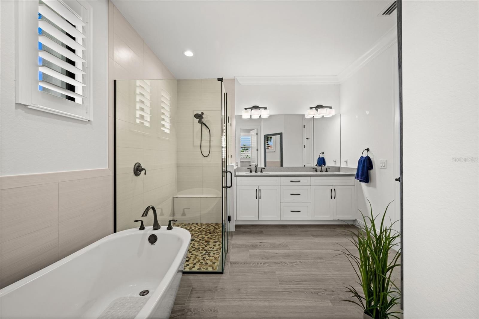 Primary bath is spacious and open