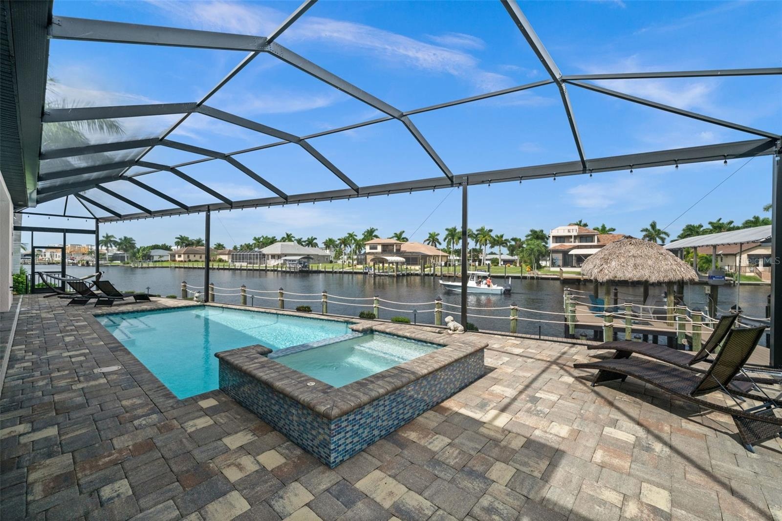 Take a dip in the spa while you watch for dolphins