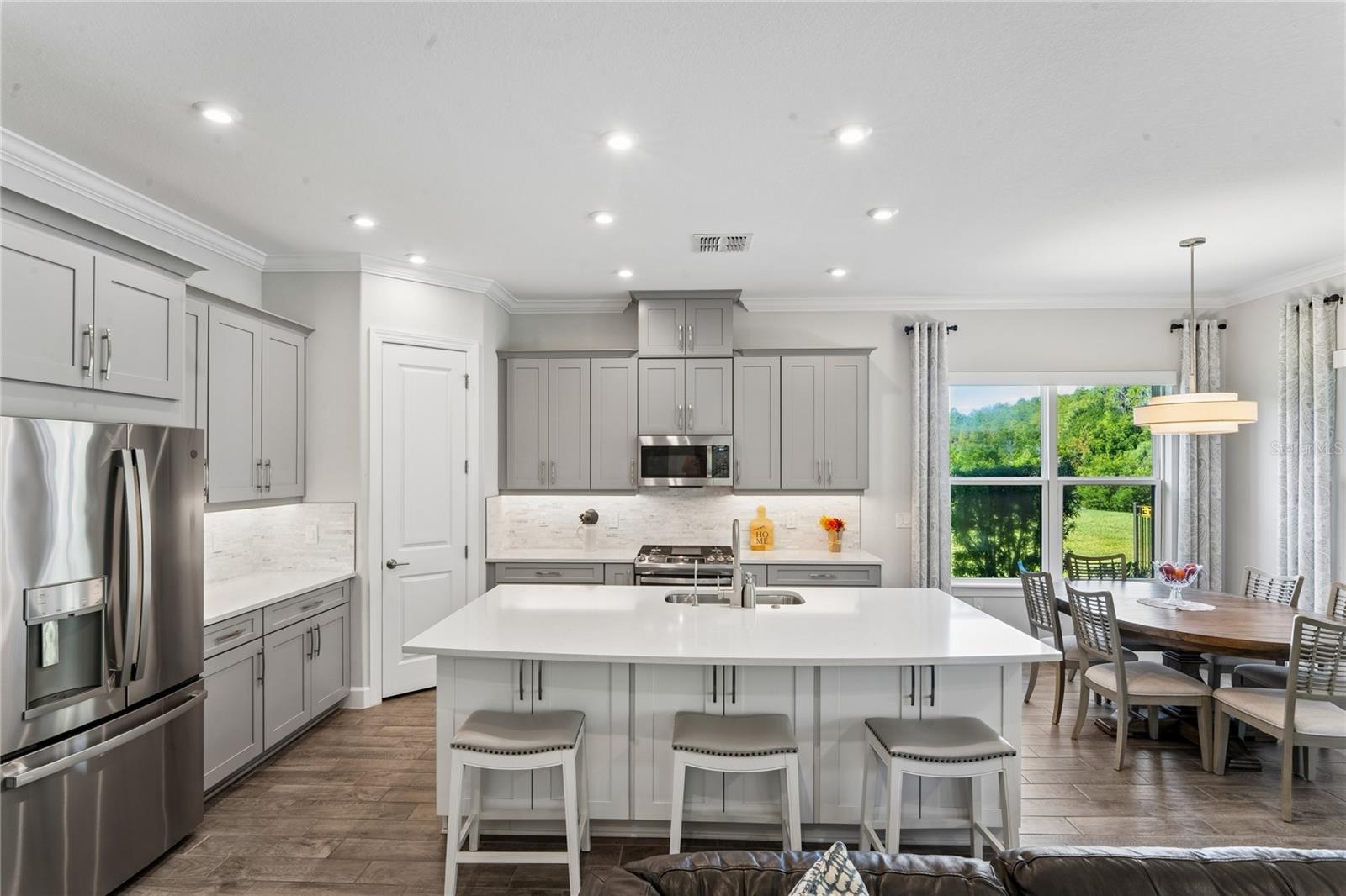 Spacious Kitchen w/ Island and kneewall cabinets