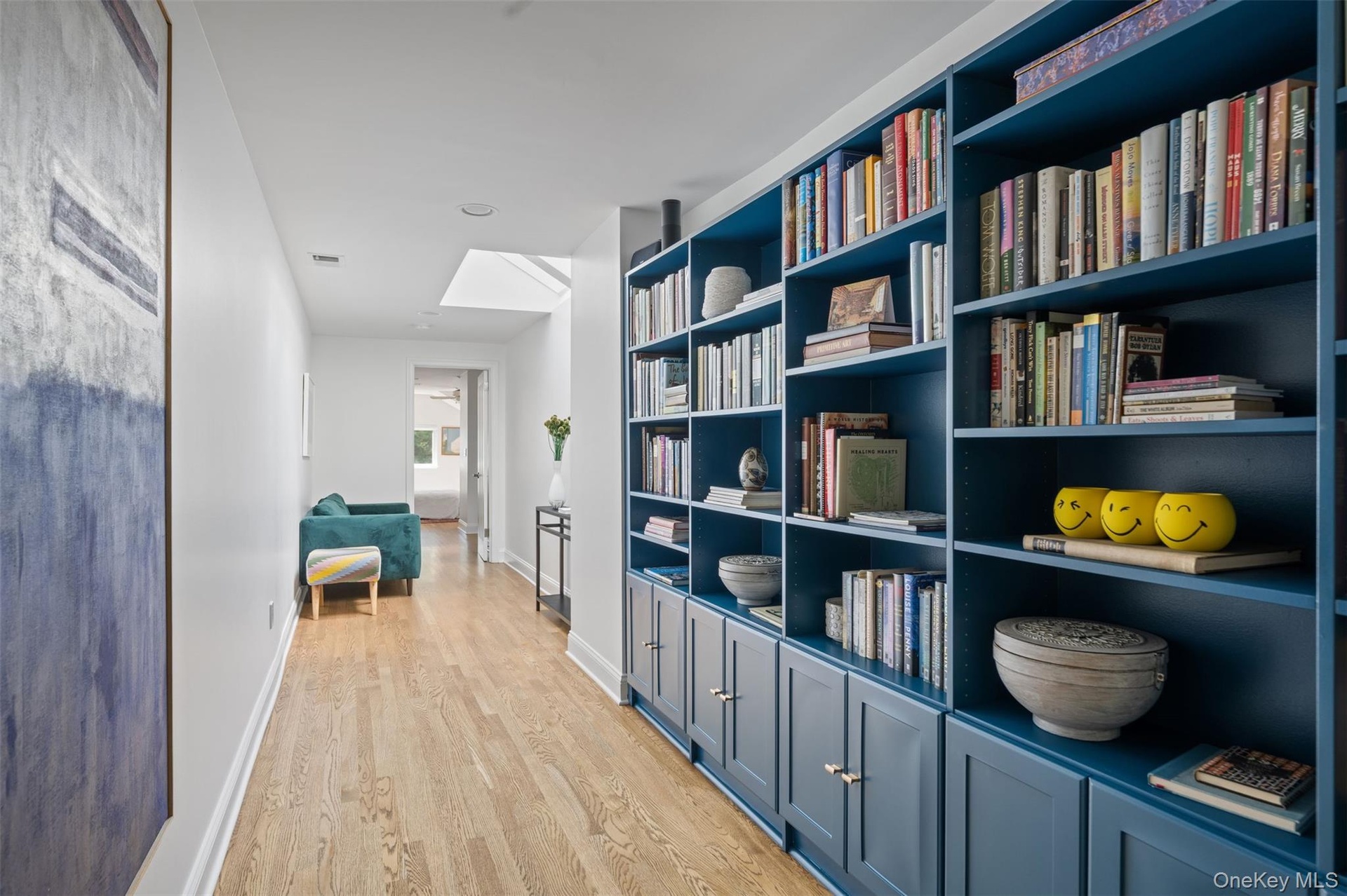 Gallery hallway leads to 3rd bedroom.