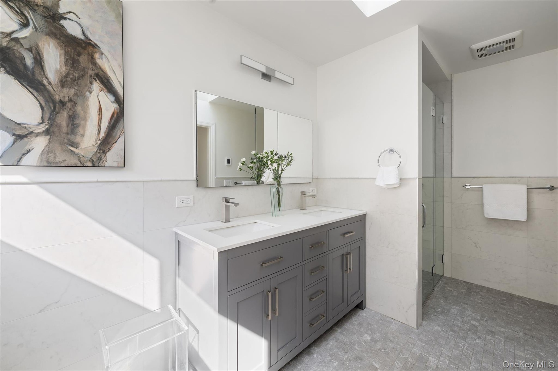 Spacious primary ensuite bathroom.