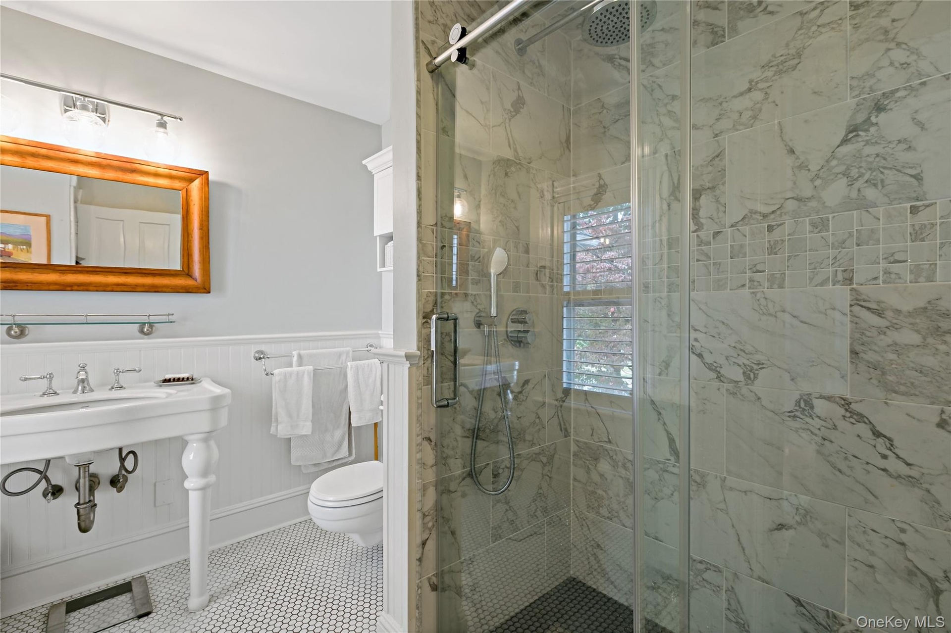 Second floor hall bath.