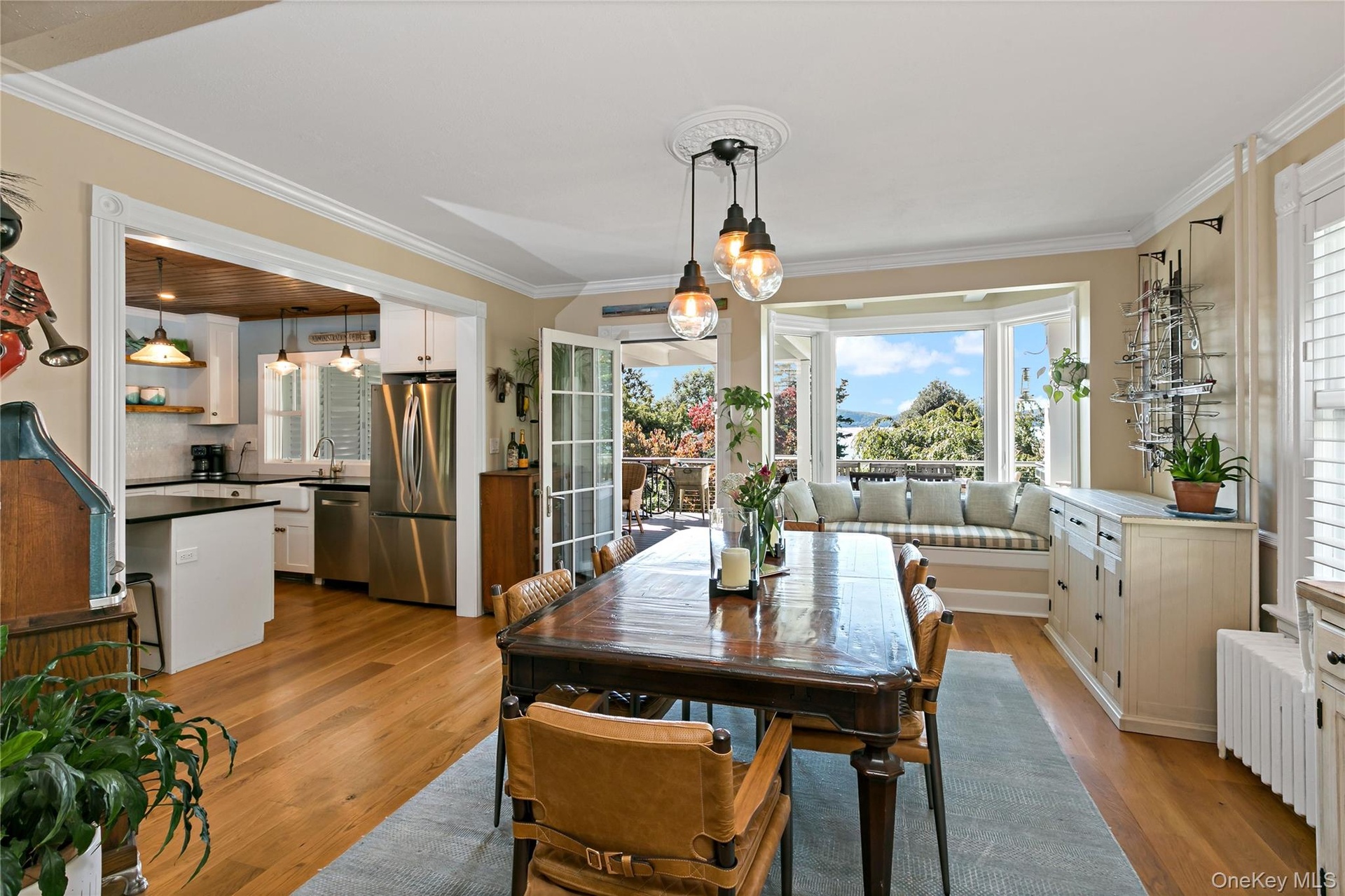 Formal dining room with custom window seat and dramatic views.