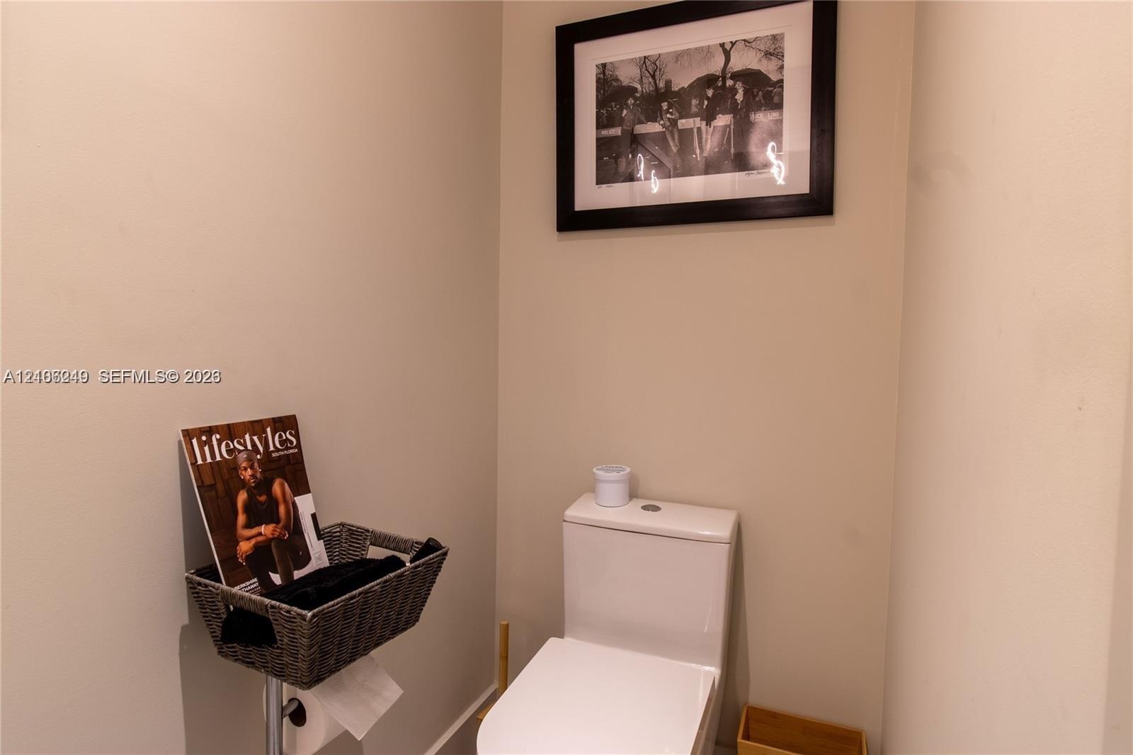 White dual-flush toilet featuring a sleek, minimalist profile