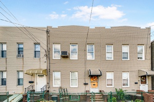 Attached Two Family Home In Maspeth Queens.