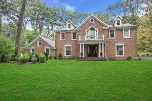 Elegant Brick Center Hall Colonial