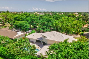 Two-story home with 5 bed/6 baths of 3,814 sqft , Coral Gables, Miami.